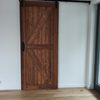 przesuwne drzwi drewniane, system do drzwi przesuwnych, przesuwane drzwi w salonie