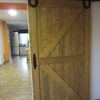 drewniane drzwi przesuwne, system przesuwny z podkową