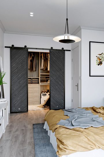 Podwójne drzwi przesuwne do garderoby wykonane z litego drewna i stali